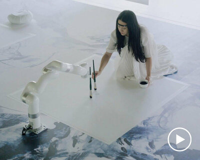 sougwen chung co-creates and meditates with multi-robotics through biosensors