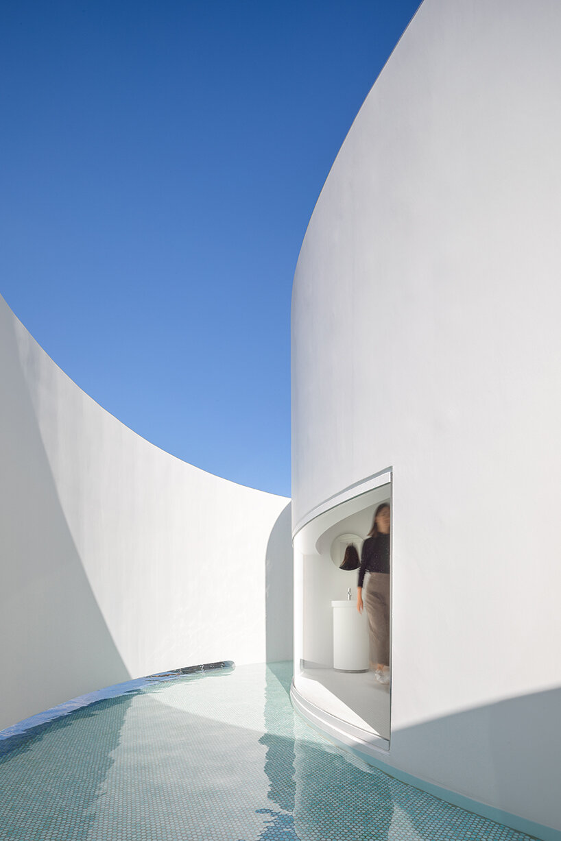 T2P architects sculpts three-layered circular plaza inspired by pipes in japan