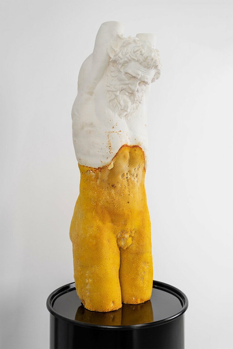 tomáš libertíny covers 'marsyas' sculpture with beeswax to symbolize healing &