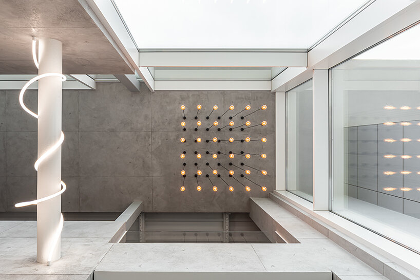 makhno studio uses organic materials to add ukrainian heritage in modern kyiv home