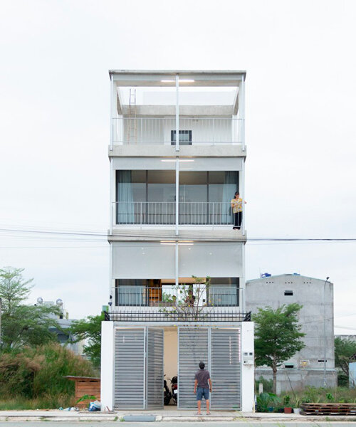 semi-transparent blinds cover the narrow front of 2713 house in vietnam