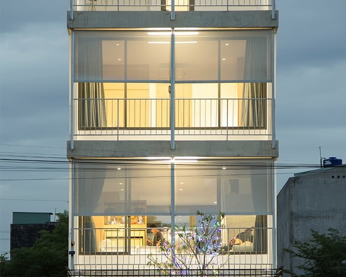 semi-transparent blinds cover the narrow front of 2713 house in vietnam