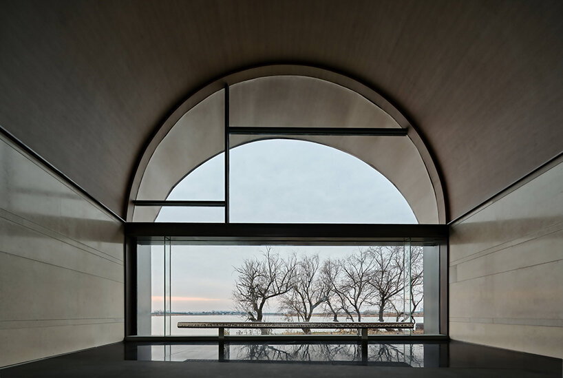 GOA and WJ studio's 'boatyard hotel' in china unfolds as a series of arched canopies