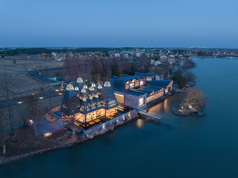 GOA and WJ studio's 'boatyard hotel' in china unfolds as a series of arched canopies