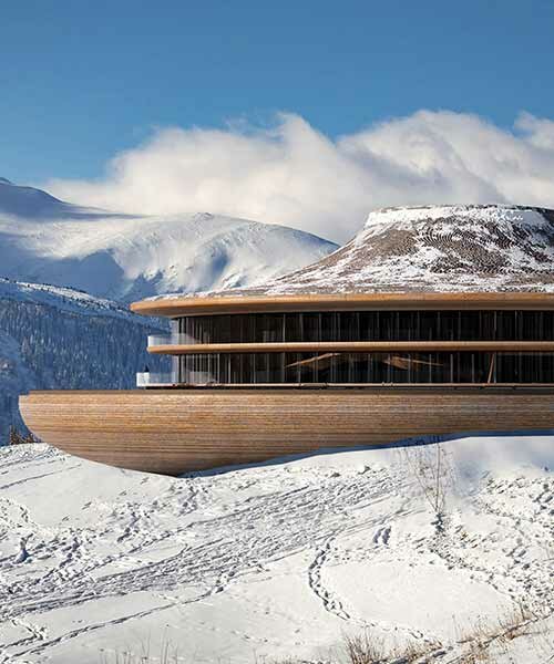 resembling a grand vessel, MAKHNO studio's hotel sails through the carpathian mountains