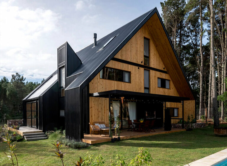 wooden gabled house folds and recesses in the woods of argentina