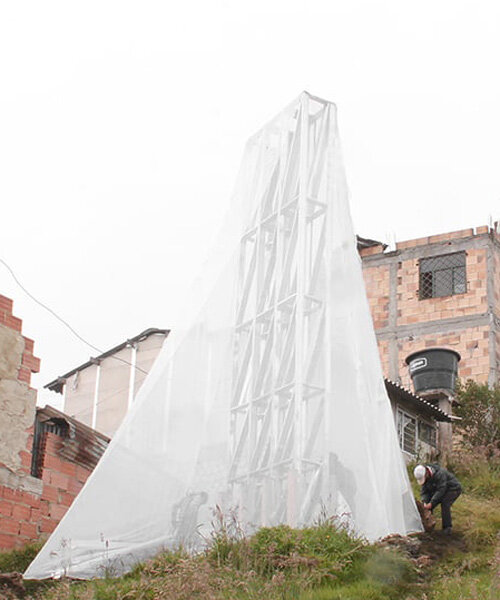 a community-built fog catcher promotes eco-friendly urban agriculture in colombia