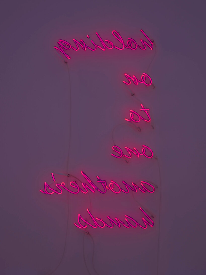 at gagosian athens, douglas gordon exhibits movie lines and song lyrics in coiled neon lights