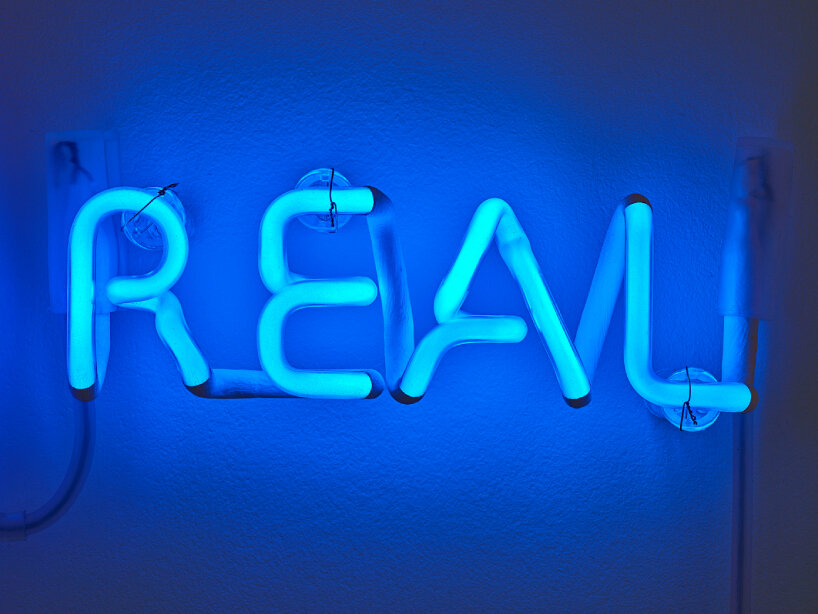 at gagosian athens, douglas gordon exhibits movie lines and song lyrics in coiled neon lights