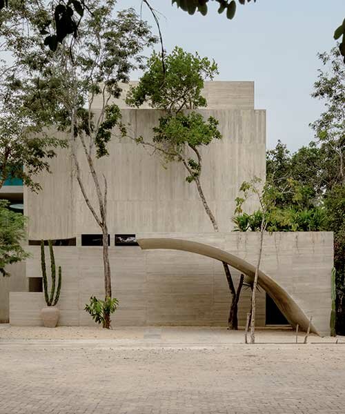 a habitable sculpture: espacio 18 infuses brutalist-inspired villa in mexico with lush greenery