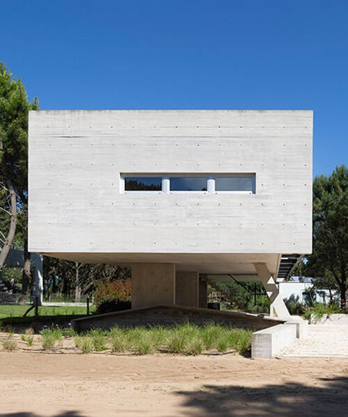 estudio galera rests monolithic home on concrete stilts to maximize space in argentina