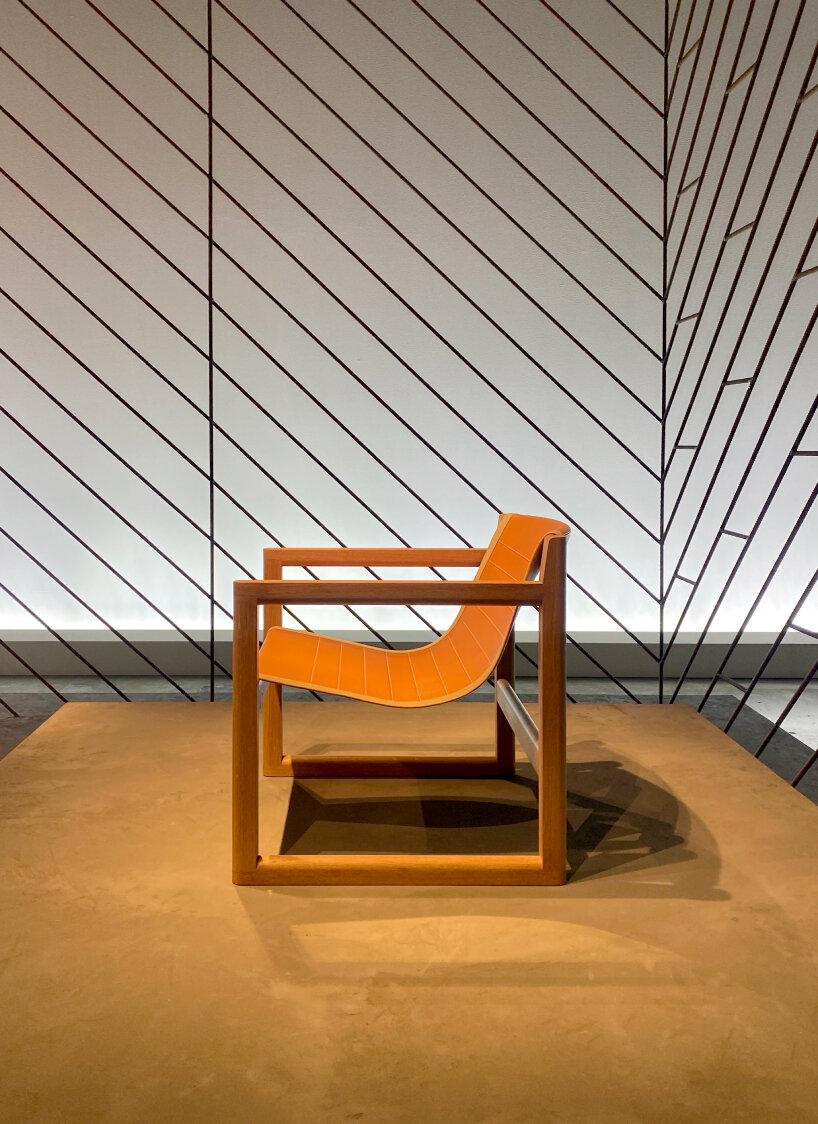 interview: Hermès encloses new home collections in transparent iron rod installation in milan