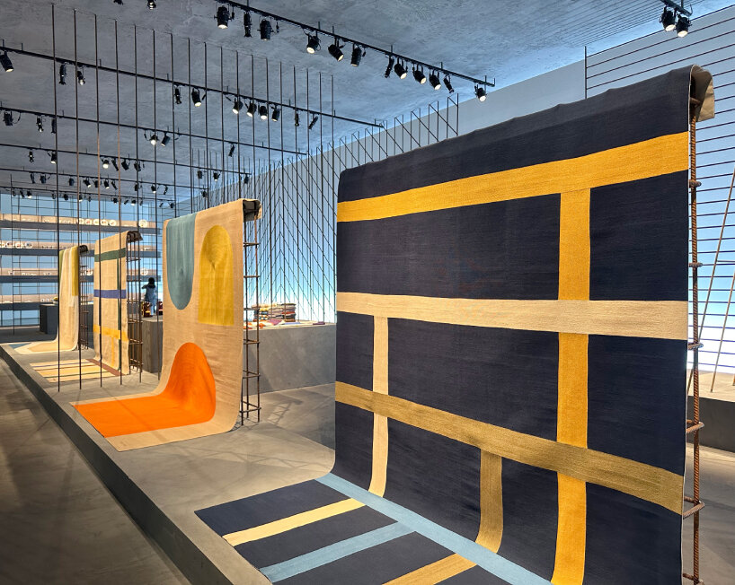 interview: Hermès encloses new home collections in transparent iron rod installation in milan