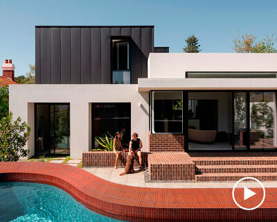 red brickwork and bone-colored walls compose hyde park house's facade in australia