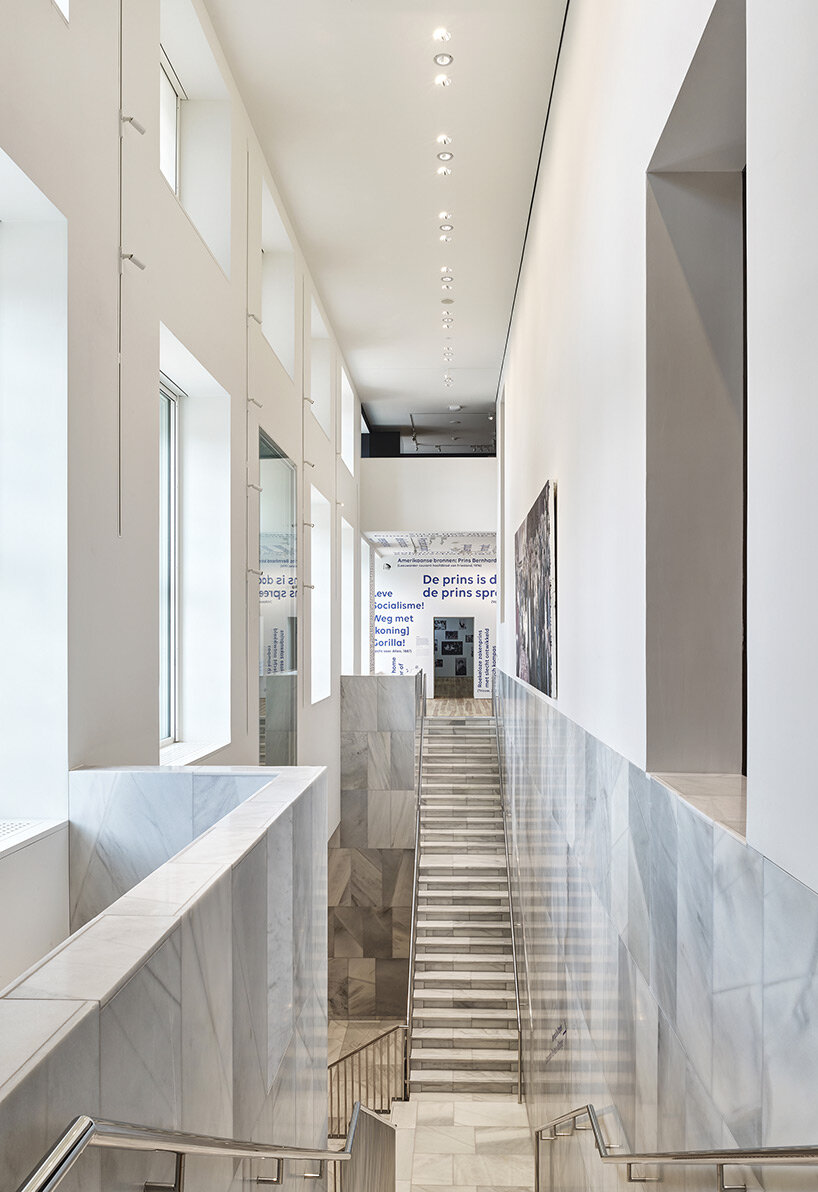 step inside KAAN's marble-clad extension for historic het loo palace in the netherlands