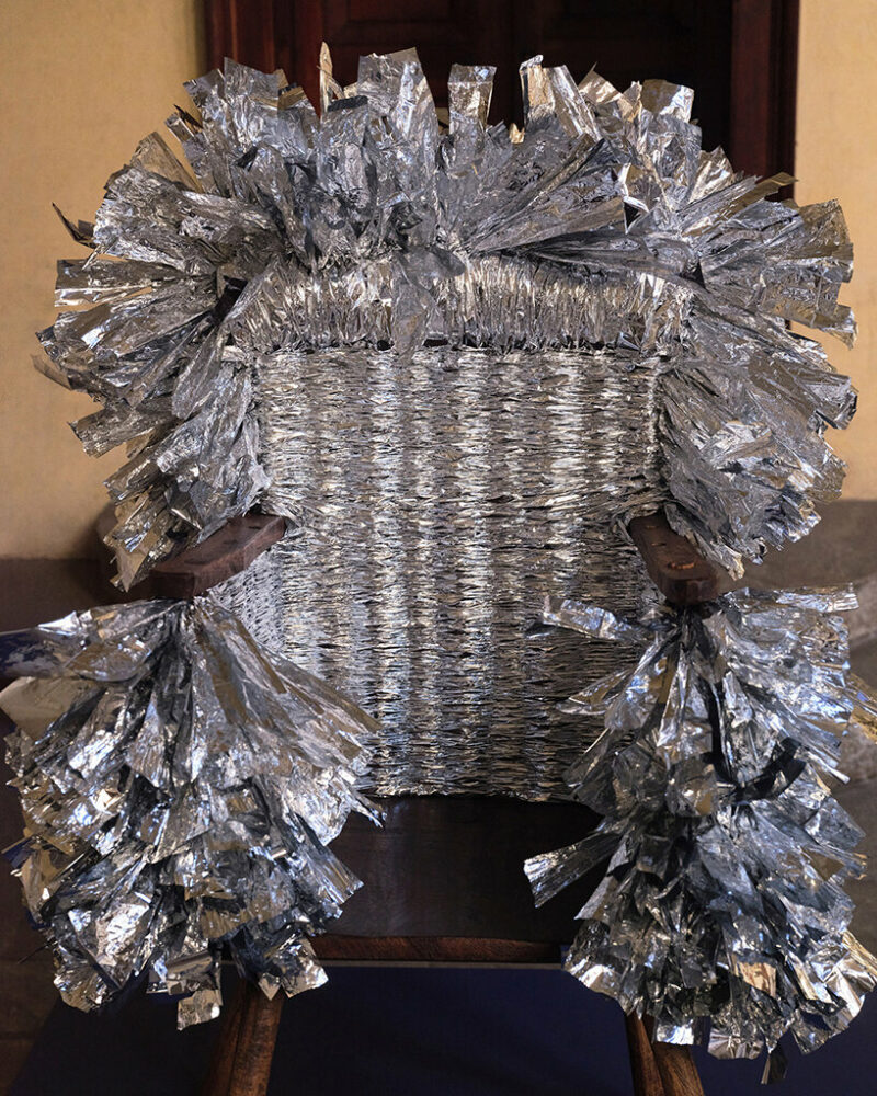 unexpected textures, colors, and materials weave into LOEWE's quirky chair collection