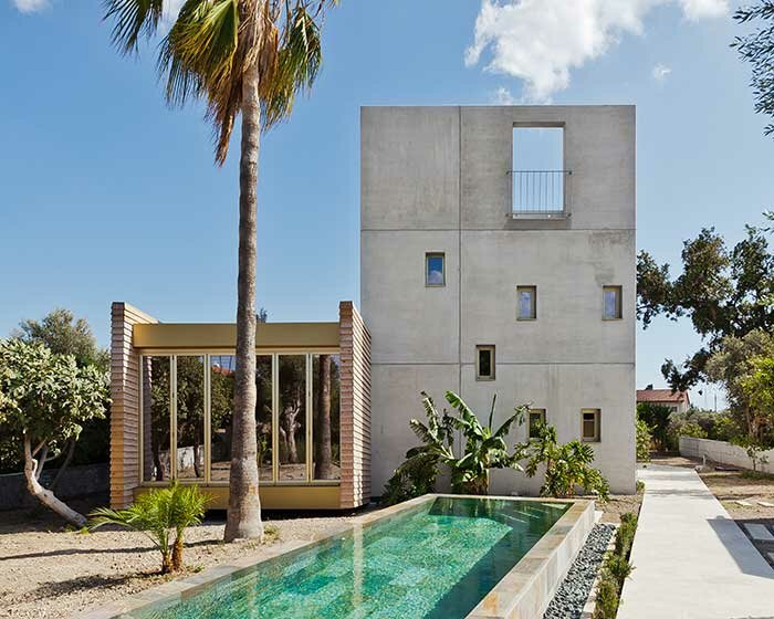 monolithic dwelling in cyprus takes its cues from medieval fortress