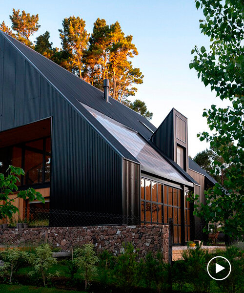 wooden gabled house folds and recesses in the woods of argentina