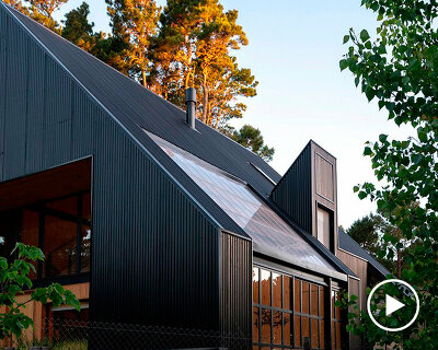 wooden gabled house folds and recesses in the woods of argentina