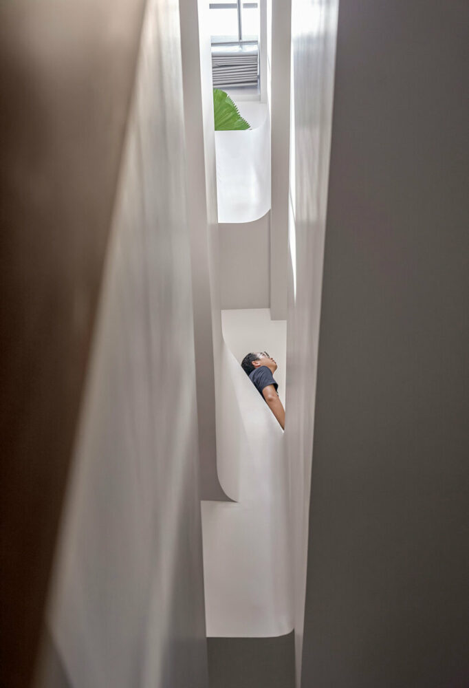 28'creative studio smooths the edges of family residence's interior in vietnam