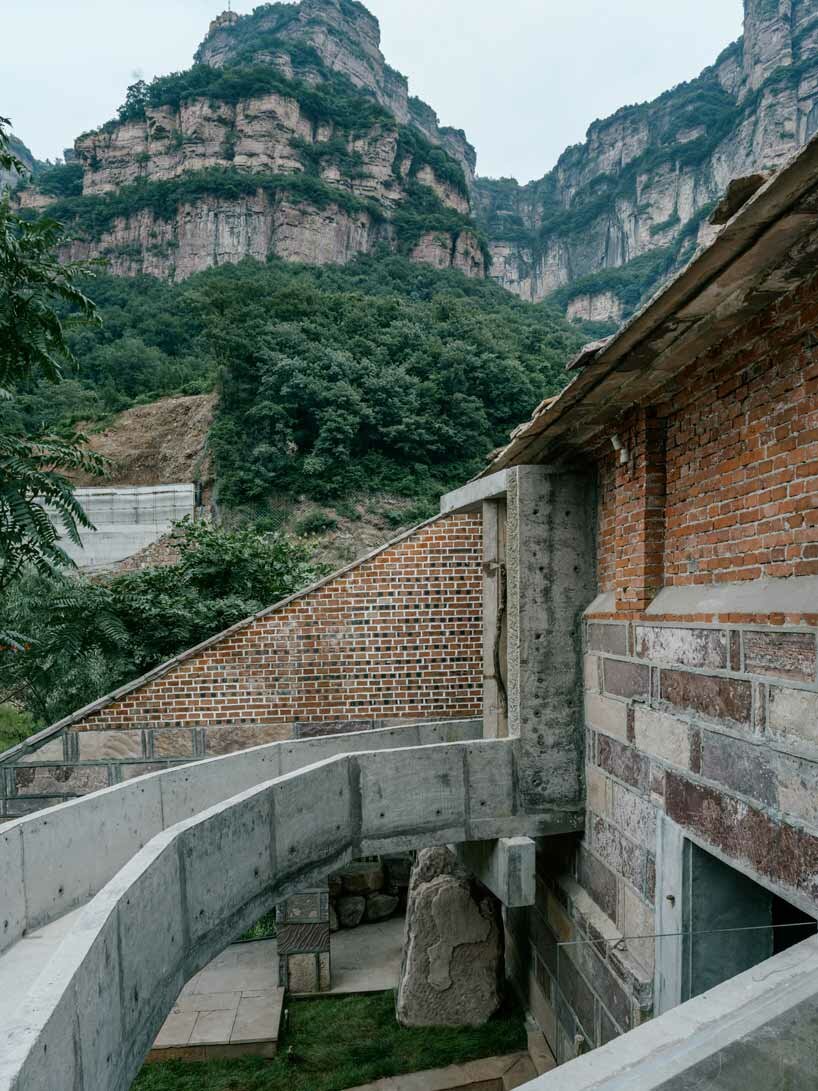 this art museum organically grows out of its rough terrain in china