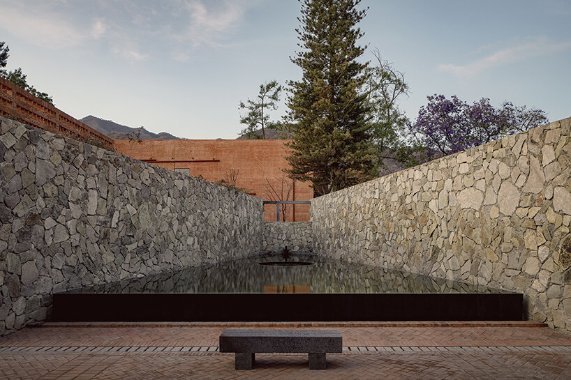 ATELIER ARS' cultural center in mexico alludes to pre-hispanic myths + natural formations