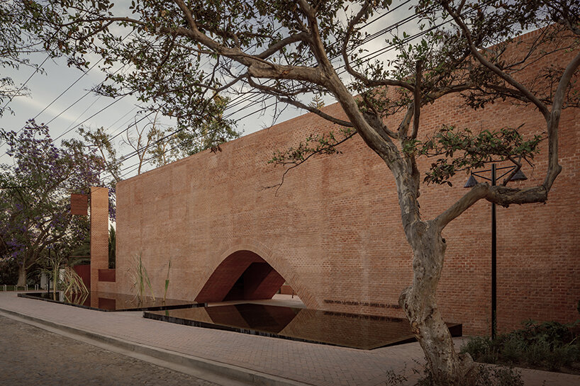 ATELIER ARS' cultural center in mexico alludes to pre-hispanic myths + natural formations