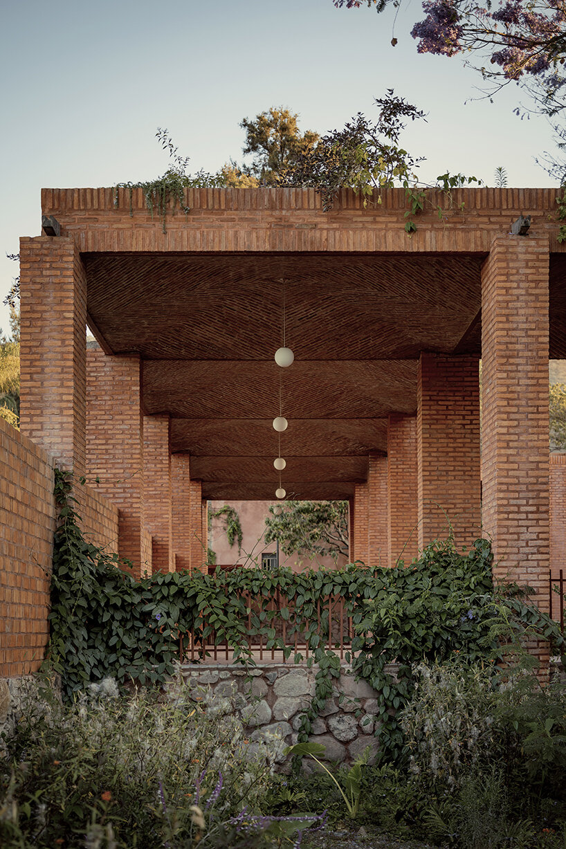 ATELIER ARS' cultural center in mexico alludes to pre-hispanic myths + natural formations