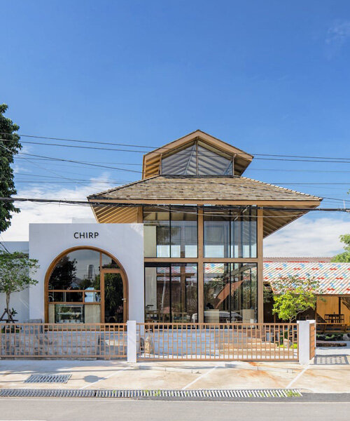 luminous café in ancient thailand unites historic context with contemporary expressions