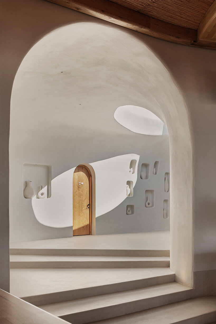 omniview's summer venue nods to cycladic aesthetic through organic forms and nooks