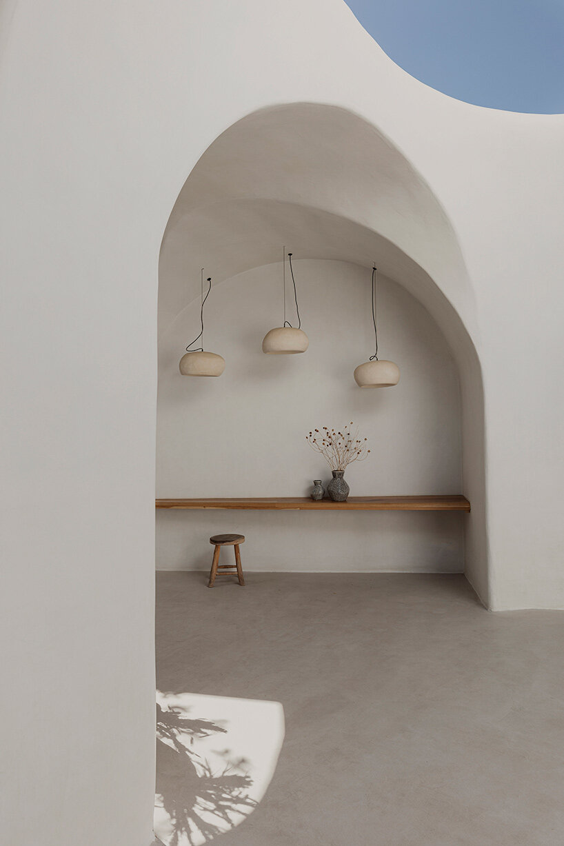 omniview's summer venue nods to cycladic aesthetic through organic forms and nooks