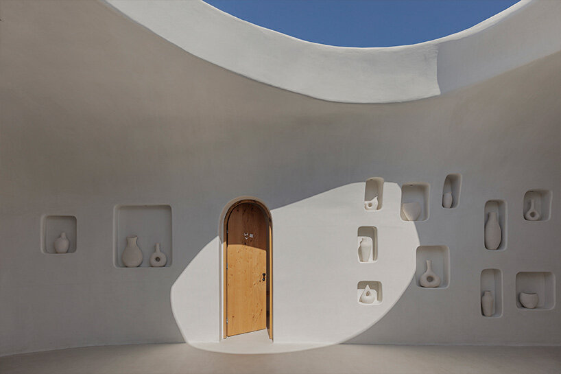 omniview's mykonian summer venue nods to cycladic interiors through organic forms and nooks