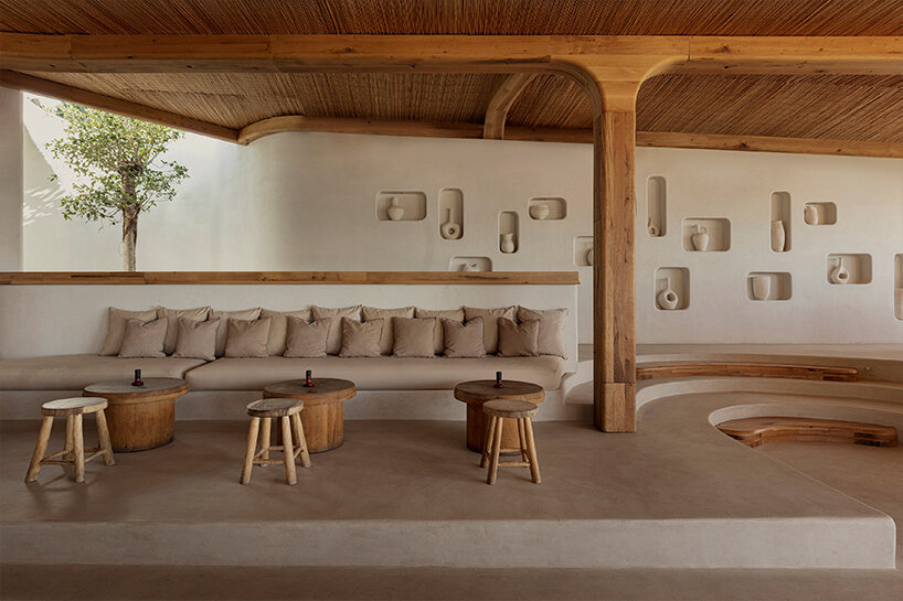 omniview's mykonian summer venue nods to cycladic interiors through organic forms and nooks