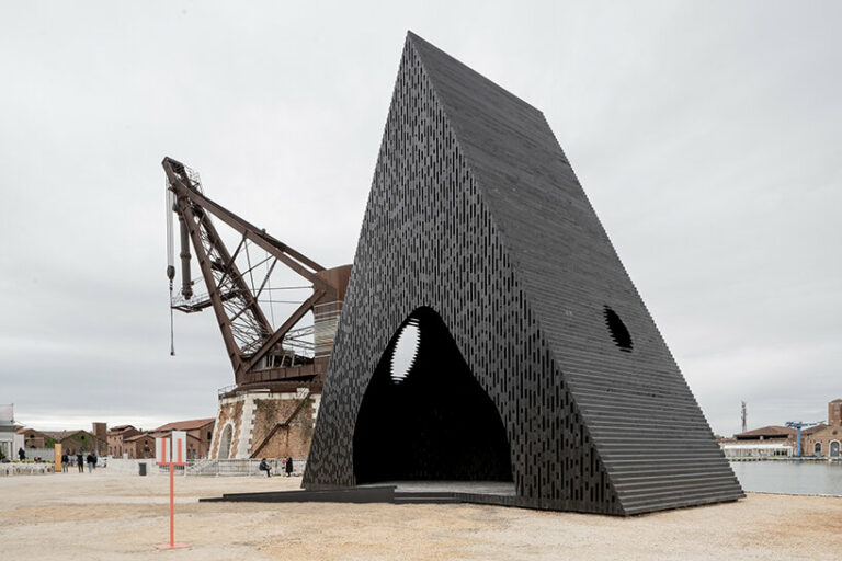 david adjaye shapes kwaeε pavilion as triangular timber prism at venice