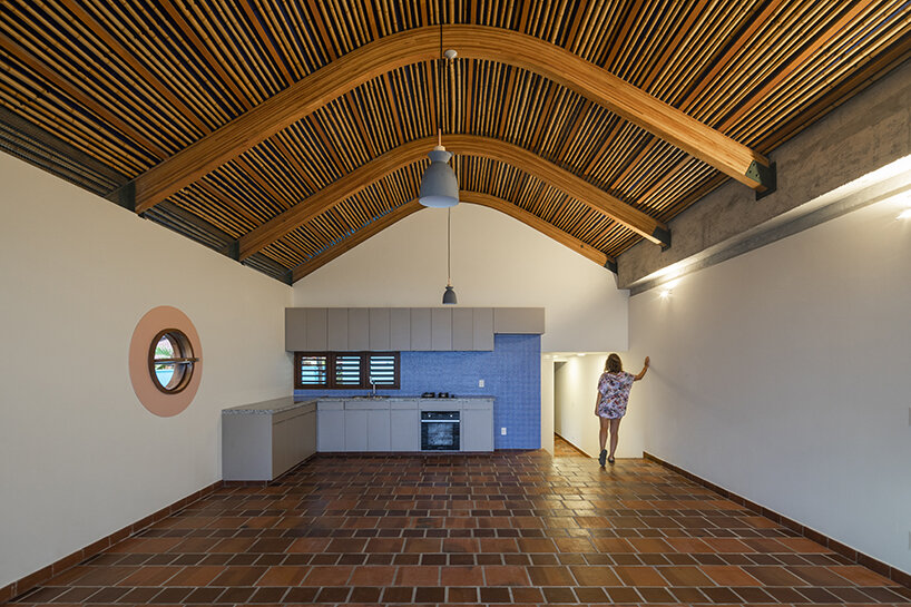 built as an inverted ship, 'gutter house' by daniel florez honors brazil's past sailor-architects
