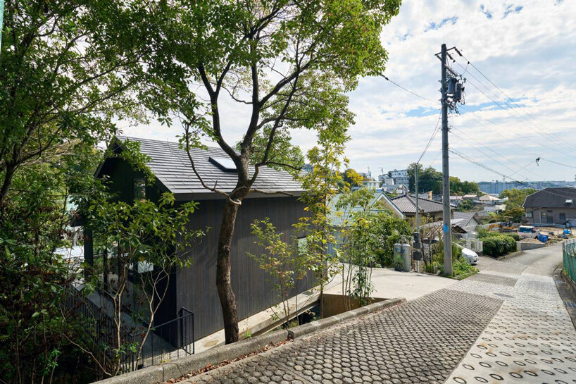 wooden house in yagota by airhouse floats in the japanese forest