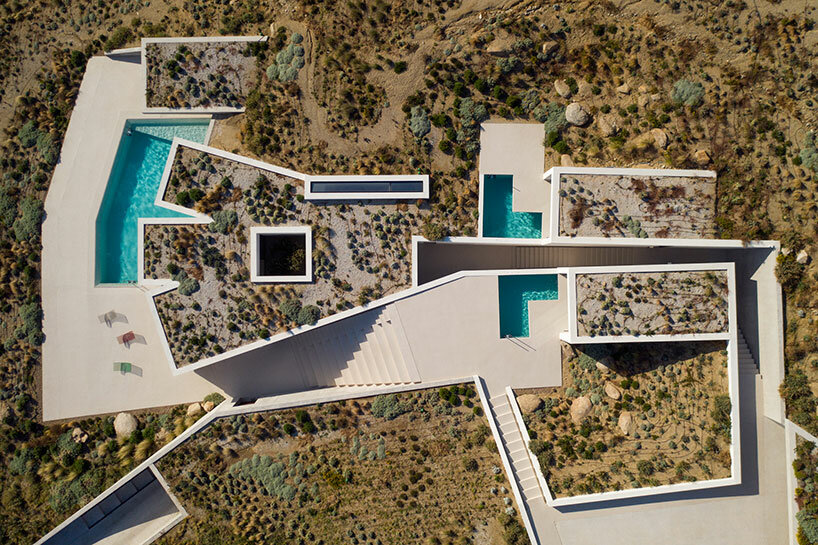 interview: a31 carves arid mykonian landscape with subterranean latypi residence in greece