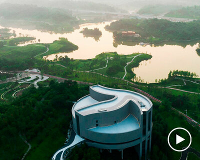 organic river forms prompt the design of tanghua architects' exhibition center in china