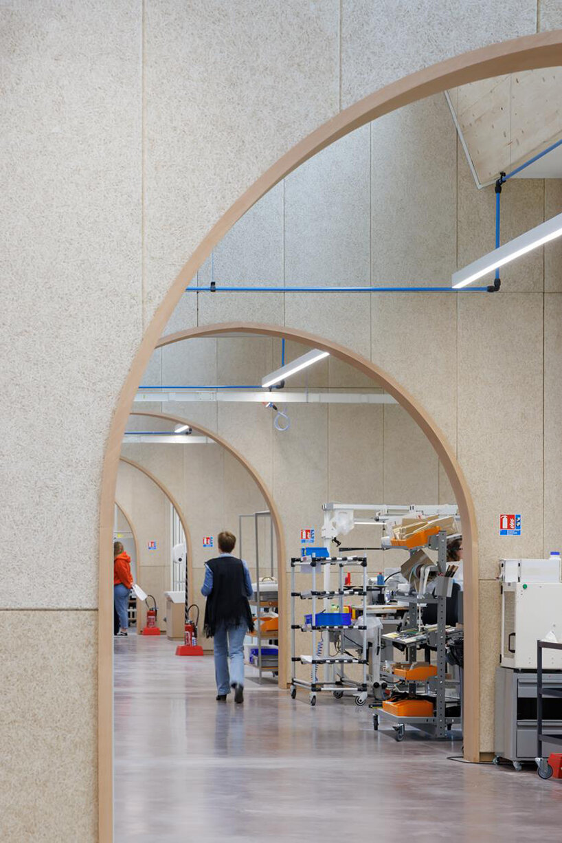 lina ghotmeh brings sweeping arches to brick-clad hermès workshop in normandy