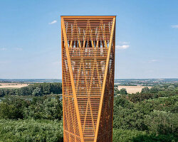 winding timber lookout tower rises above budapest's nature reserve for 360-degree vistas