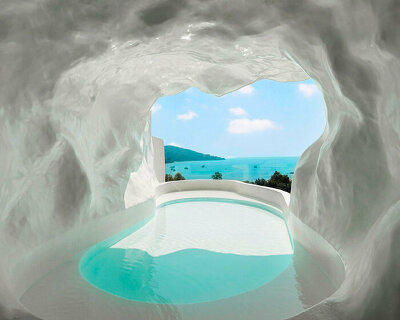cliffside resort's white caves and arches frame the views of chinese south coast