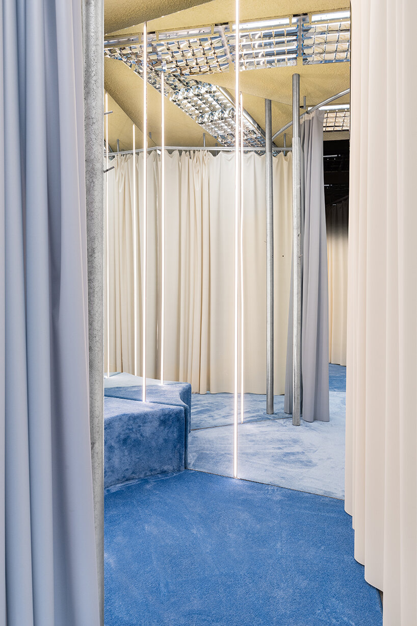 metallic meets vibrant blue inside modes milan's store design by gonzalez haase AAS