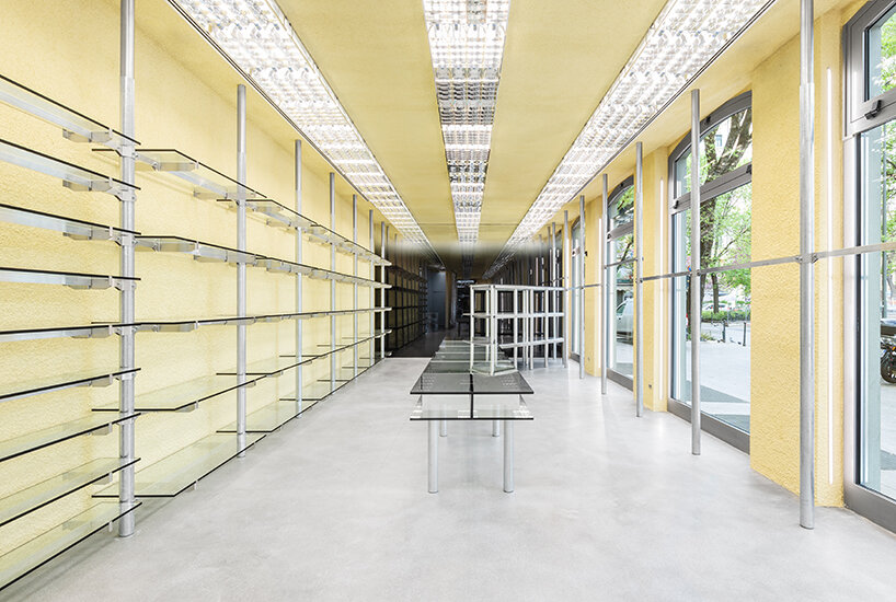 metallic meets vibrant blue inside modes milan's store design by gonzalez haase AAS