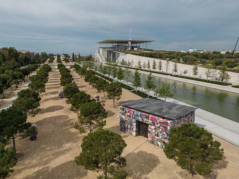 the nest collective's outdoor installation in athens evokes a dystopian waste landscape