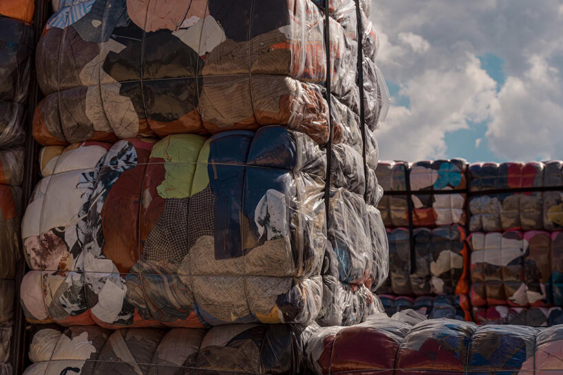the nest collective's outdoor installation in athens evokes a dystopian waste landscape