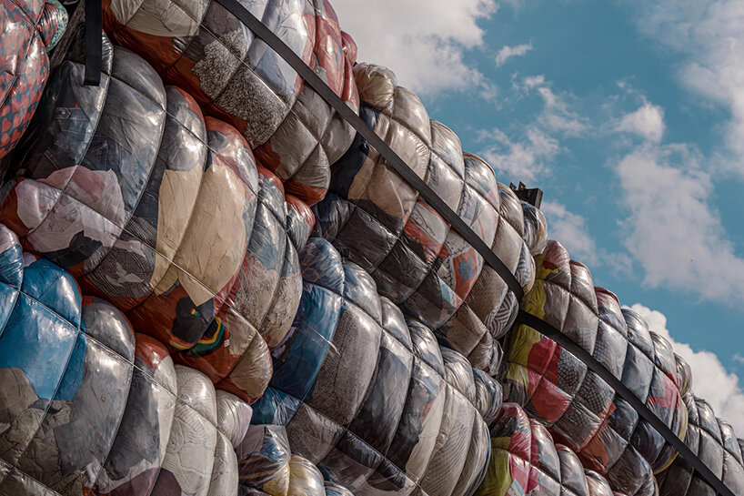 the nest collective's outdoor installation in athens evokes a dystopian waste landscape