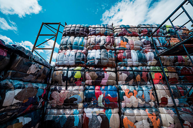 the nest collective's outdoor installation in athens evokes a dystopian waste landscape