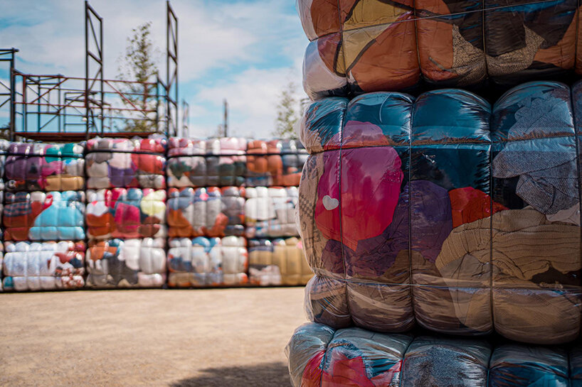 the nest collective's outdoor installation in athens evokes a dystopian waste landscape