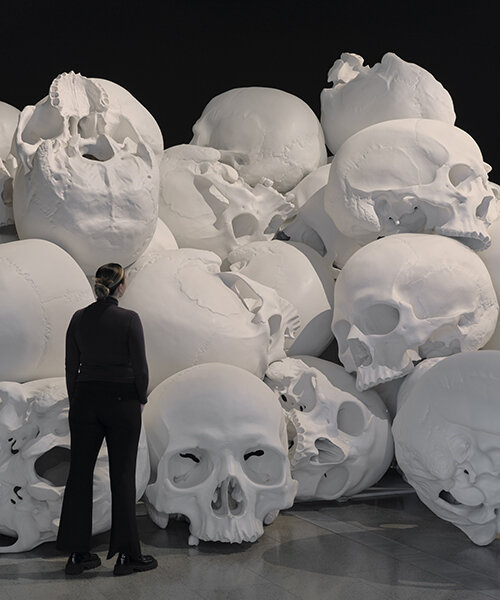 piles of oversized skulls and hyper-realistic men will show at ron mueck's paris exhibition