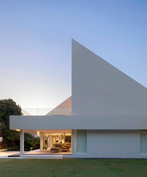 austere geometric volumes compose white 'rupu house' in bangkok